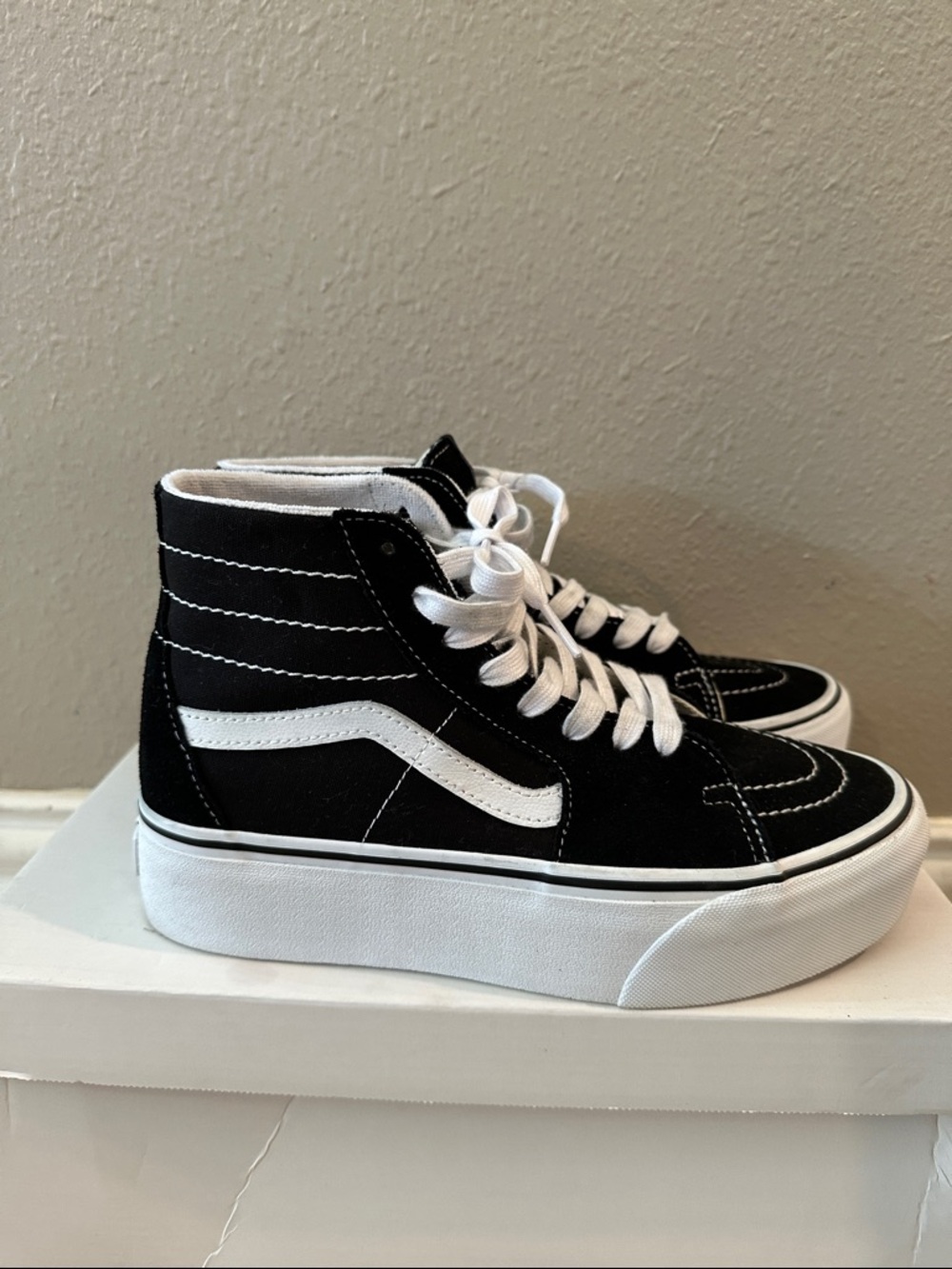 Black High-Top Vans Sneakers with White Side Stripe